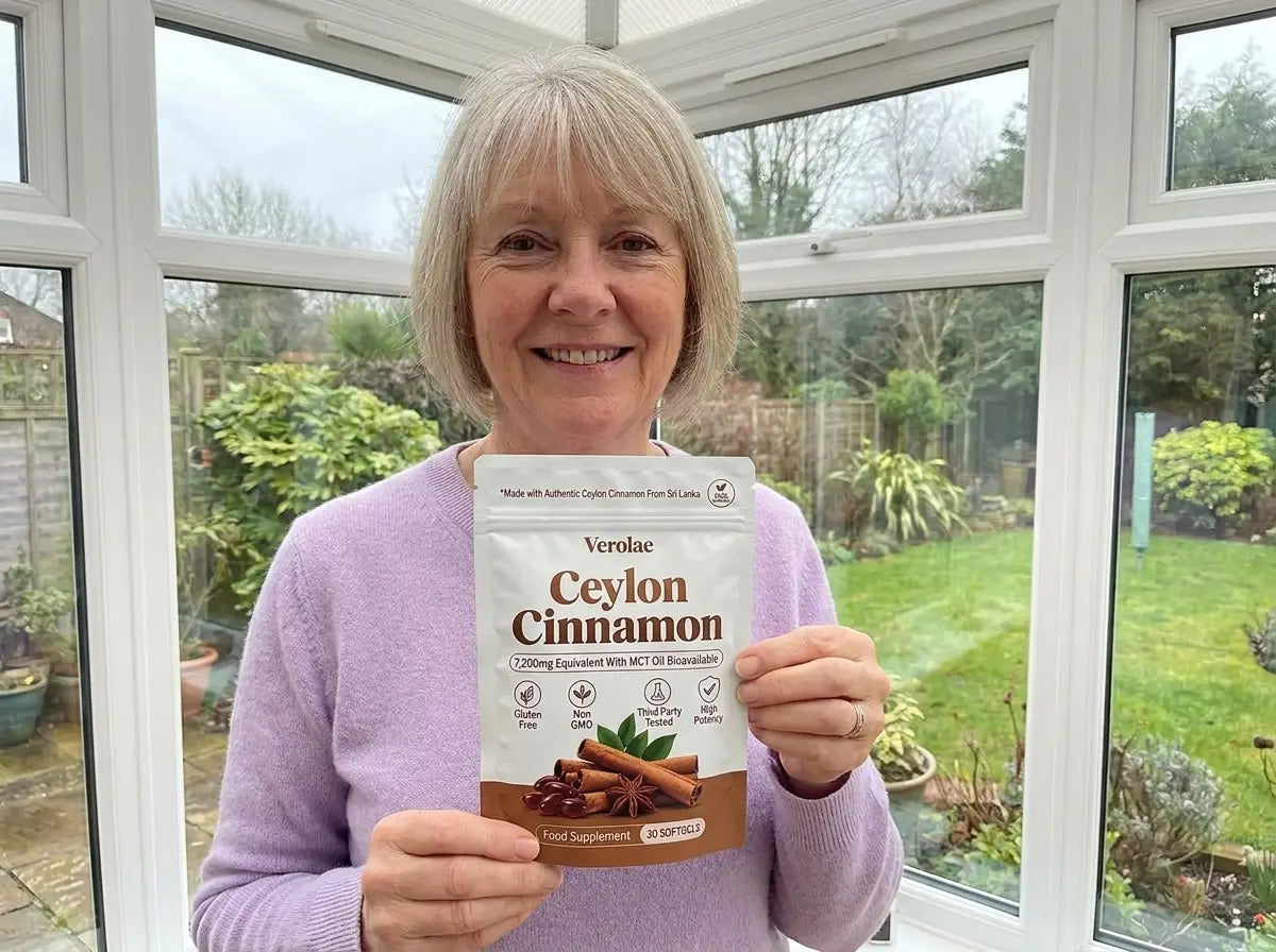 Verolae customer holding the Ceylon Cinnamon pouch in her conservatory